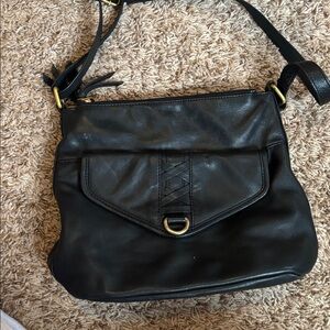 Genuine leather crossbody bag.